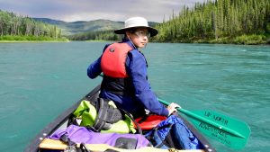 Sidi Chen on the Yukon River at the Canadian Wilderness Artist Residency