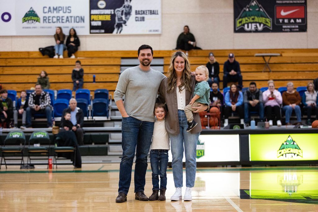 Kayla Unger stands with her husband, Carl, and two kids.